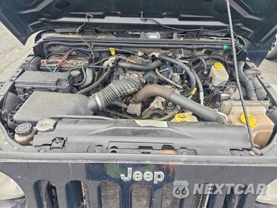 Zdjęcie 12 z 13 samochodu: 2010 JEEP WRANGLER SPORT VIN:1J4AA2D18AL157527 - miniatura