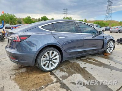 Trzecie zdjęcie samochodu z tyłu: 2018 TESLA MODEL 3 VIN:5YJ3E1EB9JF111874 - miniatura
