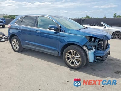 Czwarte zdjęcie samochodu z boku: 2020 FORD EDGE SEL VIN:2FMPK3J9XLBB53443 - miniatura