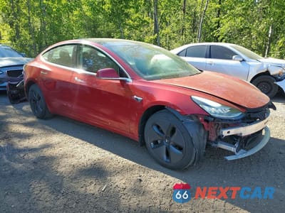 Czwarte zdjęcie samochodu z boku: 2019 TESLA MODEL 3 VIN:5YJ3E1EA5KF414286 - miniatura