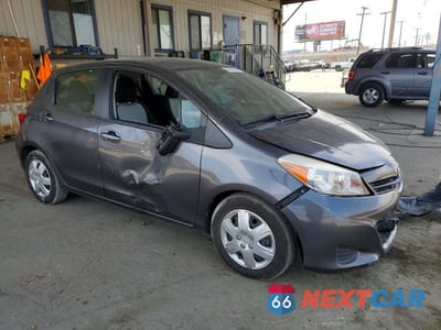 Czwarte zdjęcie samochodu z boku: 2014 TOYOTA YARIS 5-DOOR LE VIN:JTDKTUD39ED580909 - miniatura