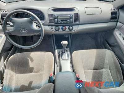 Zdjęcie 8 z 12 samochodu: 2004 TOYOTA CAMRY LE VIN:JTDBE32K340297653 - miniatura