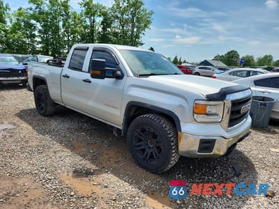 Czwarte zdjęcie samochodu z boku: 2015 GMC SIERRA K1500 VIN:1GTV2TEC0FZ209182 - miniatura