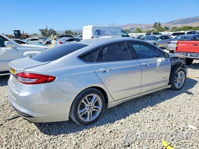 Trzecie zdjęcie samochodu z tyłu: 2018 FORD FUSION SE HYBRID VIN:3FA6P0LU0JR242668 - miniatura