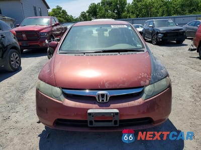 Piąte zdjęcie samochodu w środku: 2007 HONDA CIVIC LX VIN:1HGFA16547L033674 - miniatura