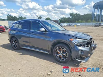 Czwarte zdjęcie samochodu z boku: 2018 BMW X1 SDRIVE28I VIN:WBXHU7C39J5H42753 - miniatura