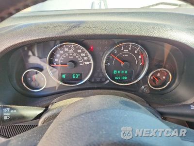 Zdjęcie 9 z 13 samochodu: 2013 JEEP WRANGLER SAHARA VIN:1C4AJWBG0DL537258 - miniatura