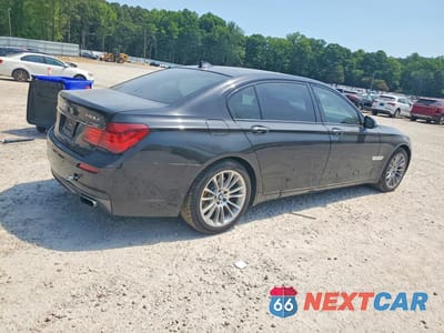 Trzecie zdjęcie samochodu z tyłu: 2014 BMW 740 LXI VIN:WBAYF4C56ED282030 - miniatura
