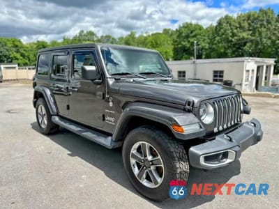 Czwarte zdjęcie samochodu z boku: 2020 JEEP WRANGLER UNLIMITED SAHARA VIN:1C4HJXEGXLW109016 - miniatura