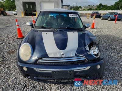 Piąte zdjęcie samochodu w środku: 2006 MINI COOPER VIN:WMWRC33556TJ75954 - miniatura