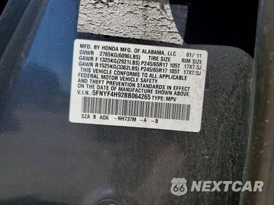 Zdjęcie 13 z 13 samochodu: 2011 HONDA PILOT TOURING VIN:5FNYF4H92BB064265 - miniatura