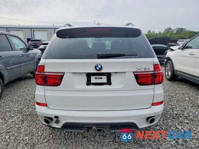 Zdjęcie 6 z 13 samochodu: 2013 BMW X5 XDRIVE35I VIN:5UXZV4C58D0B24371 - miniatura