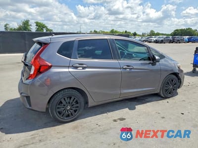 Trzecie zdjęcie samochodu z tyłu: 2015 HONDA FIT LX VIN:3HGGK5H57FM759127 - miniatura