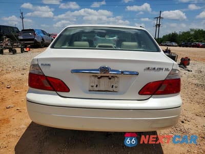 Zdjęcie 6 z 12 samochodu: 2003 TOYOTA AVALON XL VIN:4T1BF28B63U303236 - miniatura