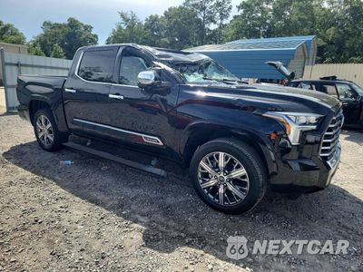 Czwarte zdjęcie samochodu z boku: 2023 TOYOTA TUNDRA CREWMAX CAPSTONE VIN:5TFVC5DBXPX023891 - miniatura