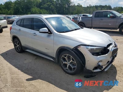Czwarte zdjęcie samochodu z boku: 2018 BMW X1 XDRIVE28I VIN:WBXHT3C36J5L24529 - miniatura