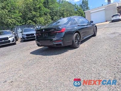 Czwarte zdjęcie samochodu z boku: 2022 BMW 750 XI VIN:WBA7U2C07NCG99224 - miniatura