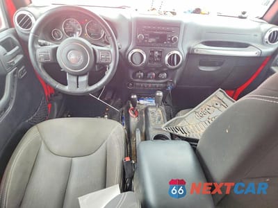 Zdjęcie 8 z 12 samochodu: 2015 JEEP WRANGLER UNLIMITED SAHARA VIN:1C4BJWEGXFL527971 - miniatura