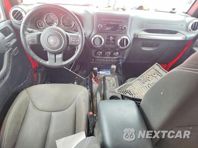 Zdjęcie 8 z 12 samochodu: 2015 JEEP WRANGLER UNLIMITED SAHARA VIN:1C4BJWEGXFL527971 - miniatura