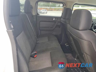 Zdjęcie 10 z 12 samochodu: 2009 HUMMER H3T VIN:5GNEN13E798125029 - miniatura
