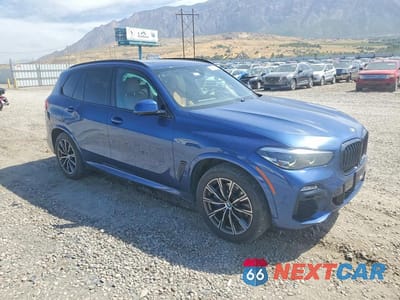 Czwarte zdjęcie samochodu z boku: 2021 BMW X5 XDRIVE40I VIN:5UXCR6C01M9F35309 - miniatura