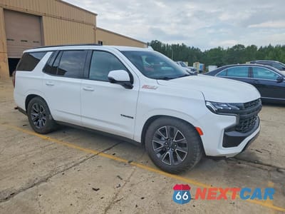 Czwarte zdjęcie samochodu z boku: 2021 CHEVROLET TAHOE K1500 Z71 VIN:1GNSKPKD6MR335655 - miniatura