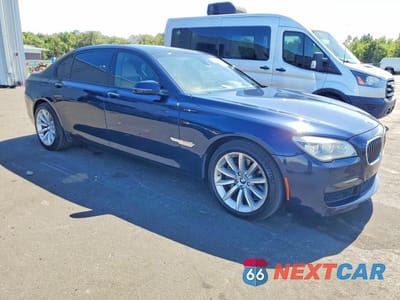 Czwarte zdjęcie samochodu z boku: 2014 BMW 750 LXI VIN:WBAYF8C59ED141850 - miniatura