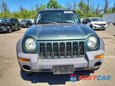 Piąte zdjęcie samochodu w środku: 2003 JEEP LIBERTY SPORT VIN:1J4GL48K23W554865 - miniatura
