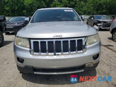 Piąte zdjęcie samochodu w środku: 2011 JEEP GRAND CHEROKEE VIN:1J4RR6GT1BC514404 - miniatura