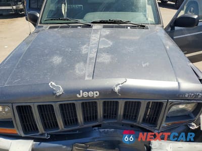 Zdjęcie 12 z 13 samochodu: 2001 JEEP CHEROKEE SPORT VIN:1J4FF48S21L600566 - miniatura