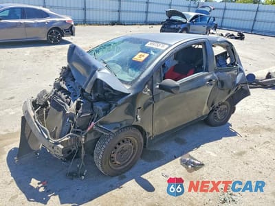 2007 TOYOTA YARIS BASE JTDJT923375134327 - główne zdjęcie licytacji z USA - miniatura