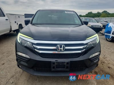 Piąte zdjęcie samochodu w środku: 2017 HONDA PILOT EXL VIN:5FNYF6H57HB074873 - miniatura