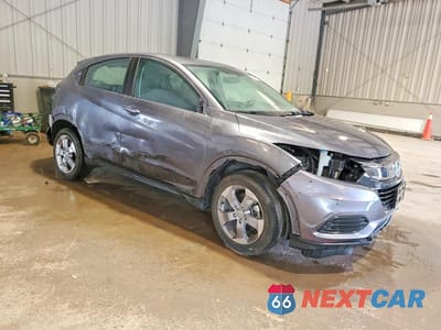 Czwarte zdjęcie samochodu z boku: 2020 HONDA HR-V LX VIN:3CZRU6H3XLM724898 - miniatura