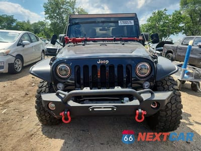 Piąte zdjęcie samochodu w środku: 2015 JEEP WRANGLER UNLIMITED RUBICON VIN:1C4BJWFG3FL606073 - miniatura