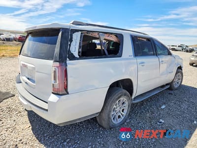 Trzecie zdjęcie samochodu z tyłu: 2017 GMC YUKON XL K1500 SLE VIN:1GKS2FKC1HR265437 - miniatura