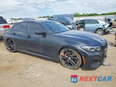 Czwarte zdjęcie samochodu z boku: 2022 BMW M340I VIN:3MW5U7J00N8C71989 - miniatura