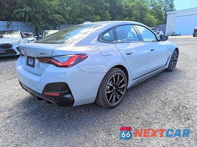 Czwarte zdjęcie samochodu z boku: 2026 BMW I4 XDRIVE 40 VIN:WBY43HD09TFW31167 - miniatura
