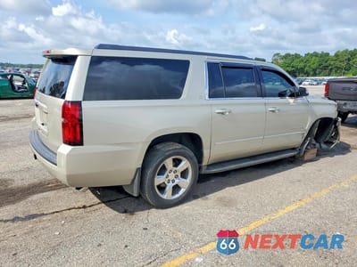 Trzecie zdjęcie samochodu z tyłu: 2016 CHEVROLET SUBURBAN C1500 LT VIN:1GNSCHKC3GR110852 - miniatura