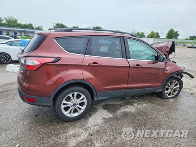 Trzecie zdjęcie samochodu z tyłu: 2018 FORD ESCAPE SE VIN:1FMCU0GD0JUB51758 - miniatura