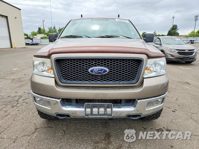 Piąte zdjęcie samochodu w środku: 2004 FORD F150 VIN:1FTRF145X4NA95127 - miniatura
