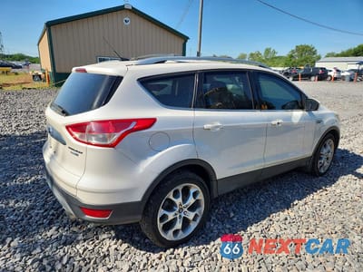 Trzecie zdjęcie samochodu z tyłu: 2014 FORD ESCAPE TITANIUM VIN:1FMCU9J92EUB59021 - miniatura