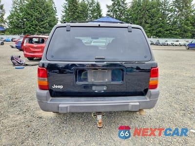 Zdjęcie 6 z 13 samochodu: 1998 JEEP GRAND CHEROKEE LAREDO VIN:1J4GZ58SXWC372695 - miniatura