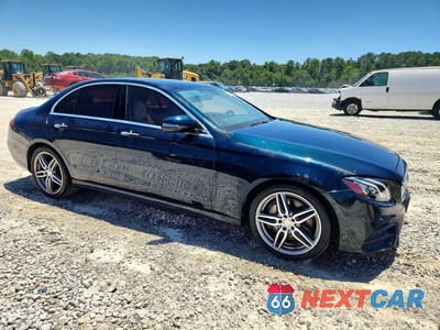 Czwarte zdjęcie samochodu z boku: 2017 MERCEDES-BENZ E 300 VIN:WDDZF4JB2HA057602 - miniatura