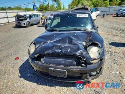 Piąte zdjęcie samochodu w środku: 2009 MINI COOPER VIN:WMWMR33549TJ94380 - miniatura
