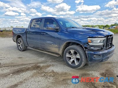 Czwarte zdjęcie samochodu z boku: 2024 RAM 1500 LARAMIE VIN:1C6SRFJT6RN159378 - miniatura