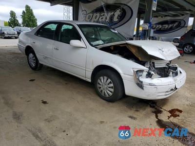 Czwarte zdjęcie samochodu z boku: 1999 TOYOTA CAMRY LE VIN:JT2BG22K7X0289606 - miniatura