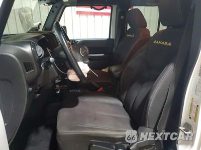 Zdjęcie 7 z 13 samochodu: 2013 JEEP WRANGLER UNLIMITED SAHARA VIN:1C4BJWEG1DL601775 - miniatura