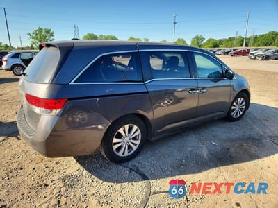 Trzecie zdjęcie samochodu z tyłu: 2014 HONDA ODYSSEY EXL VIN:5FNRL5H67EB020372 - miniatura