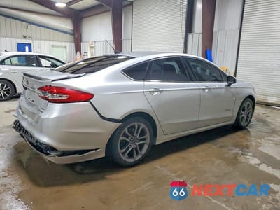 Trzecie zdjęcie samochodu z tyłu: 2018 FORD FUSION SE HYBRID VIN:3FA6P0LU7JR155821 - miniatura