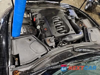 Zdjęcie 11 z 12 samochodu: 2004 JAGUAR XK8 VIN:SAJDA42C142A37702 - miniatura